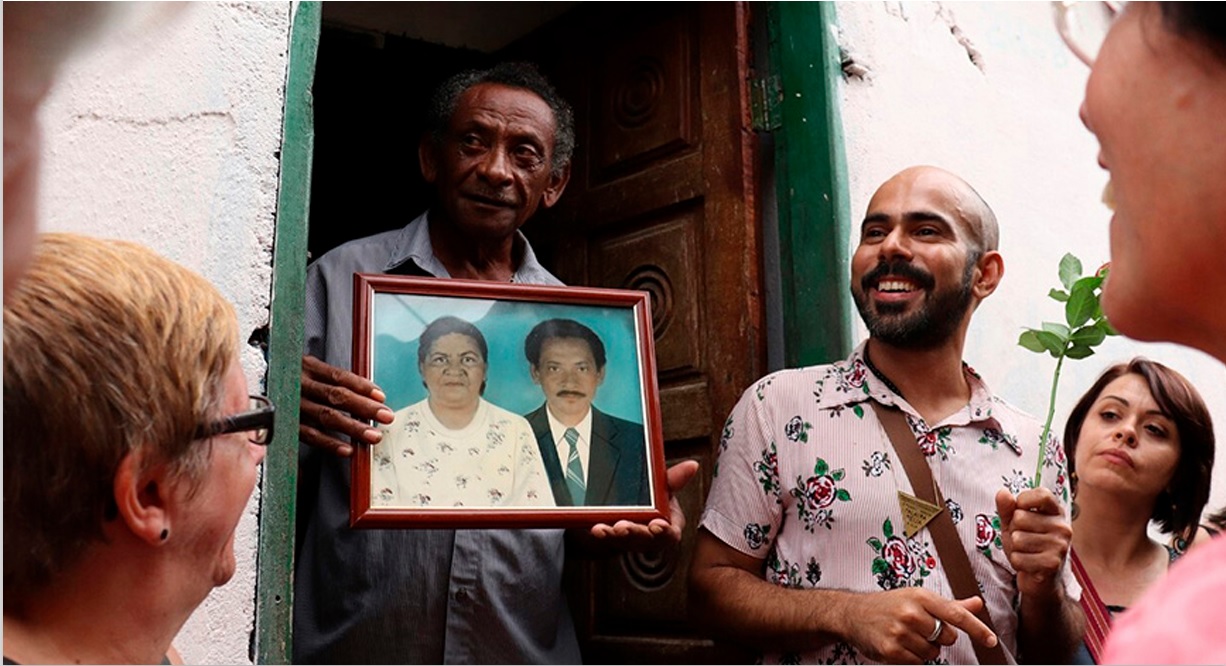 Seu Antônio, Jhoao Junnior e público em A cidade dos rios invisíveis

