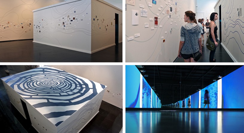  Nayda Collazo- Llorens, Unfolding the Triangle (Lake Michigan), 2012. Wall installation with tape, mixed media
on paper, and objects. Dark room with a four-channel video and mirrors. Installation view at Richmond
Center for Visual Arts, Kalamazoo,
MI. Courtesy of the artist.